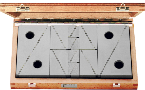 Set of uni step clamp blocks in wood box